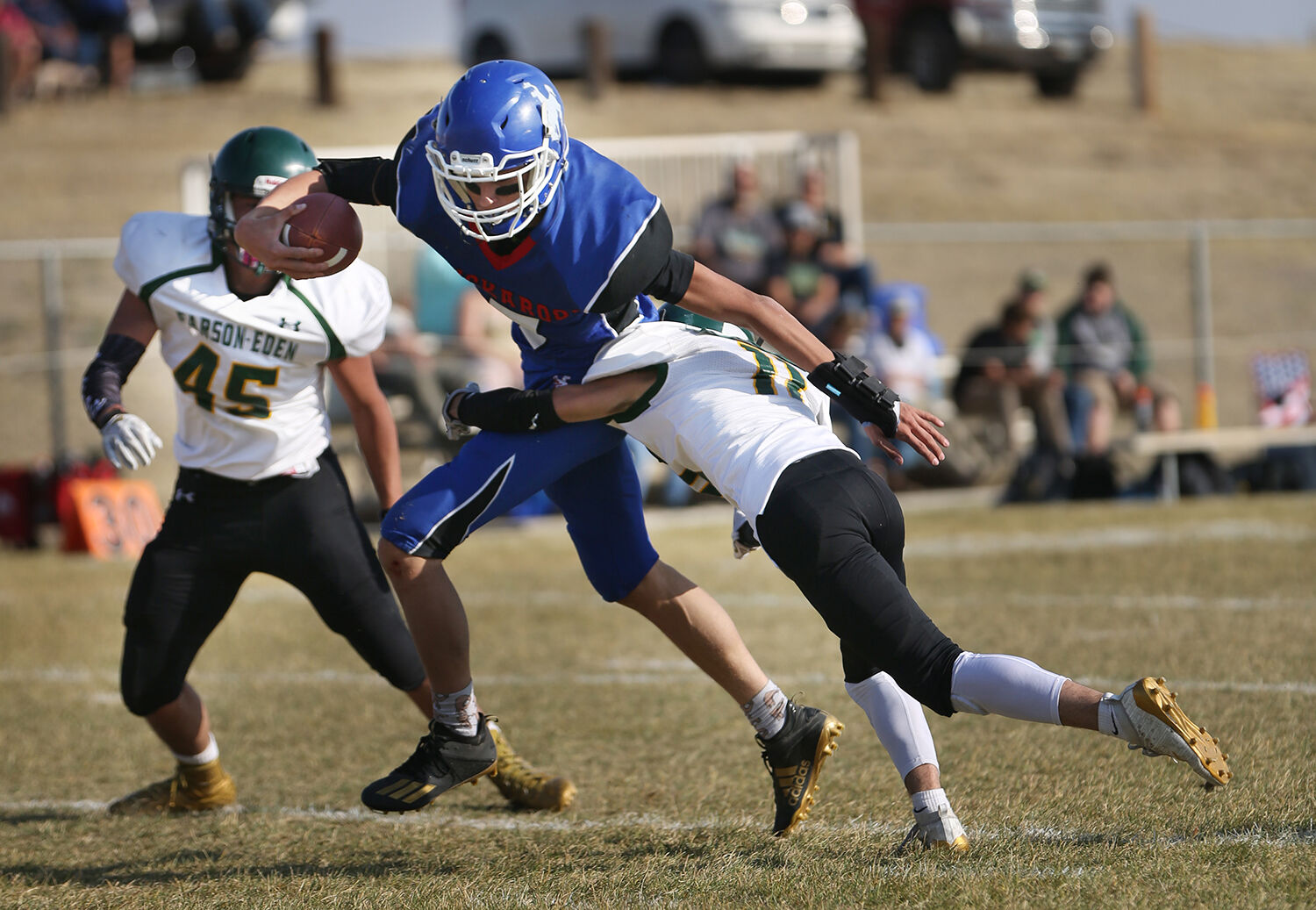 Harley Davis pulls through a tackle to gain a few last yards